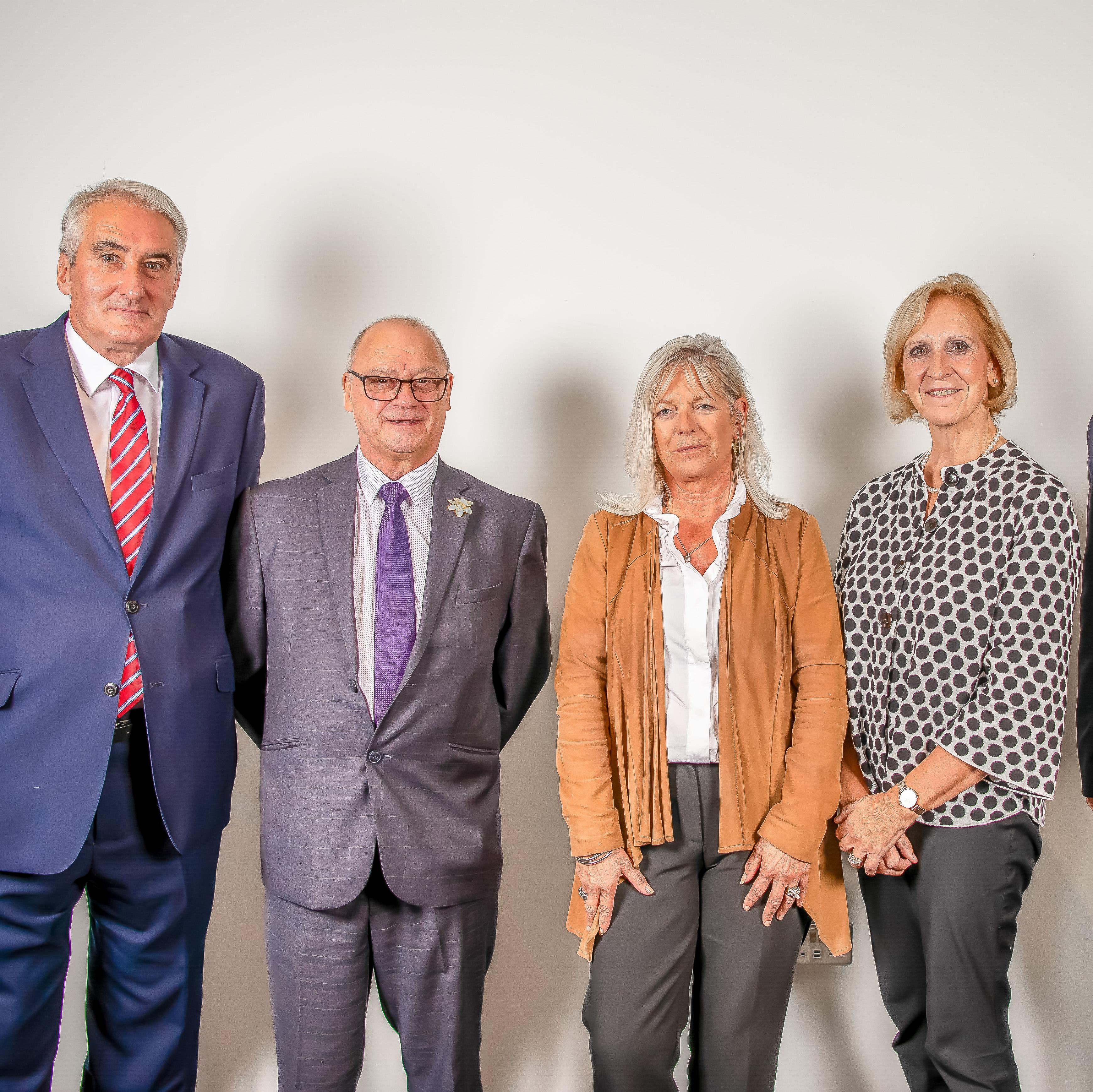 Board members standing (cropped)